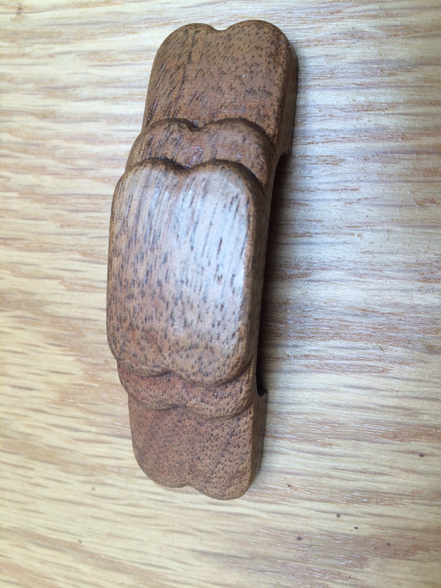 Layered style 3 inch cabinet door pull in finished walnut thumb